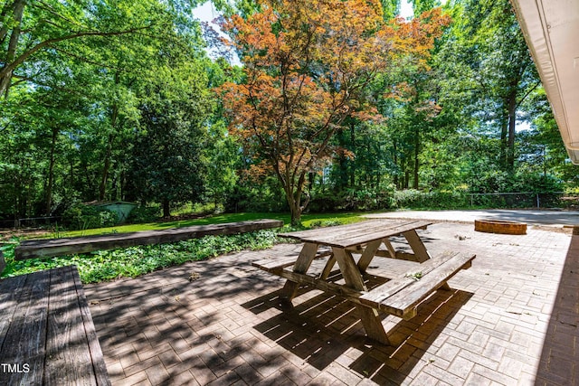 5205 Rembert Dr, Raleigh, NC 27612 - deck with a patio and outdoor dining space