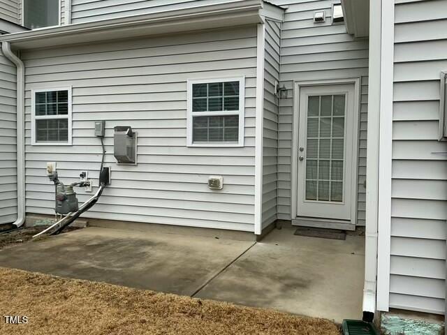 doorway to property featuring a patio area