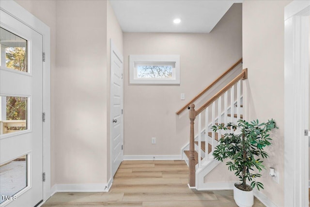 foyer entrance featuring light hardwood / wood-style flooring