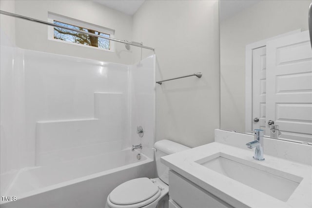 full bathroom featuring shower / washtub combination, vanity, and toilet