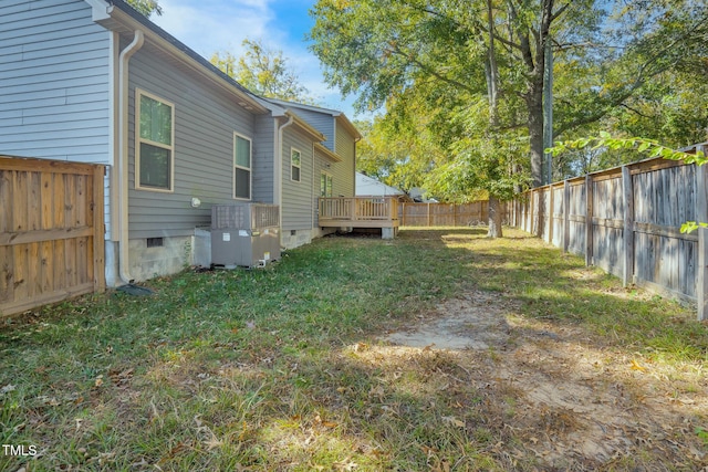 view of yard with a wooden deck