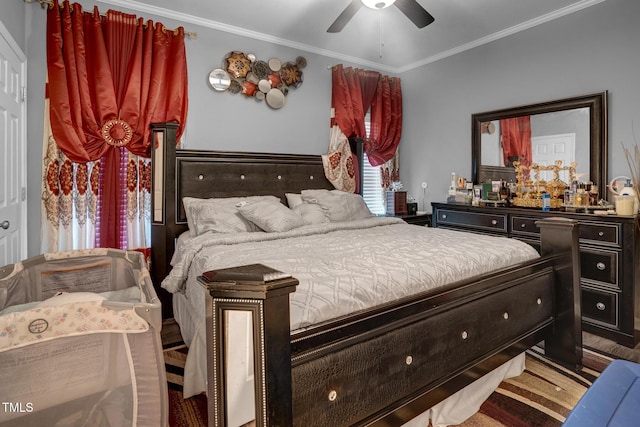 bedroom with ceiling fan and crown molding