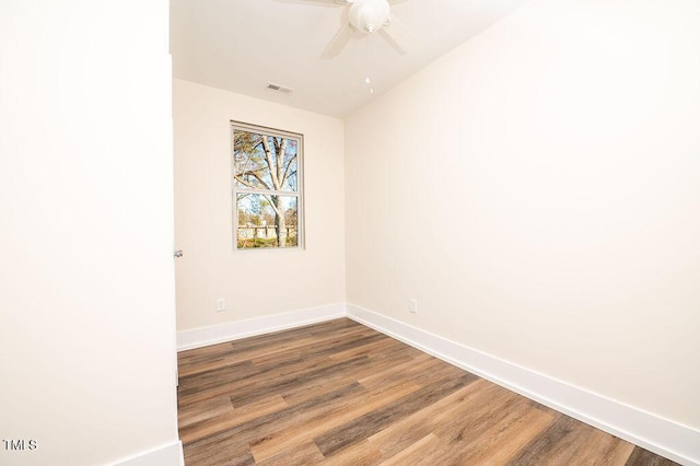 unfurnished room with ceiling fan and wood-type flooring