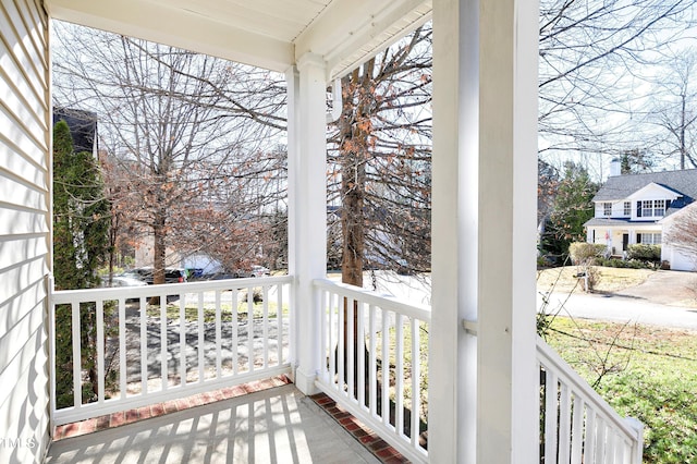 balcony featuring covered porch