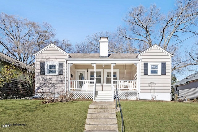 view of front of home featuring a porch and a front lawn