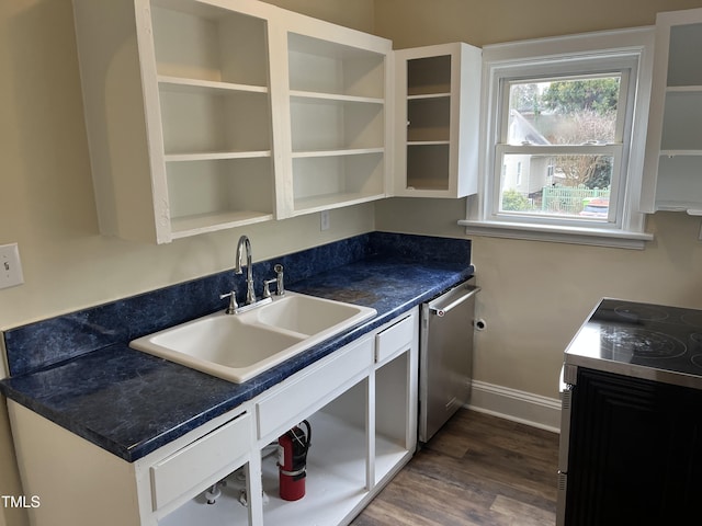 kitchen featuring sink, dark hardwood / wood-style flooring, and appliances with stainless steel finishes