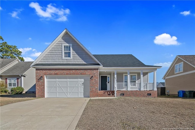 view of front facade featuring a porch and a garage