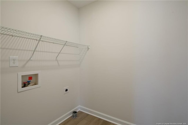 laundry room featuring washer hookup, electric dryer hookup, and hardwood / wood-style flooring