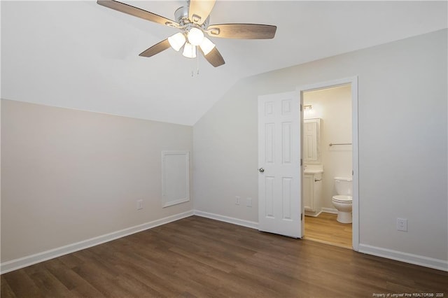 additional living space featuring dark hardwood / wood-style flooring, ceiling fan, and lofted ceiling