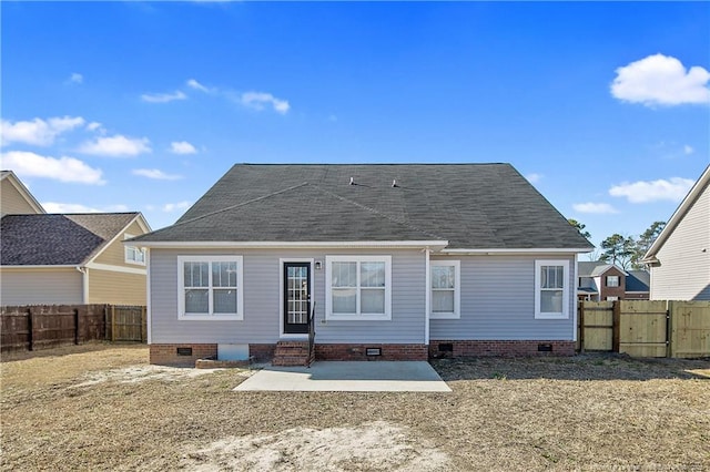 rear view of property featuring a patio area