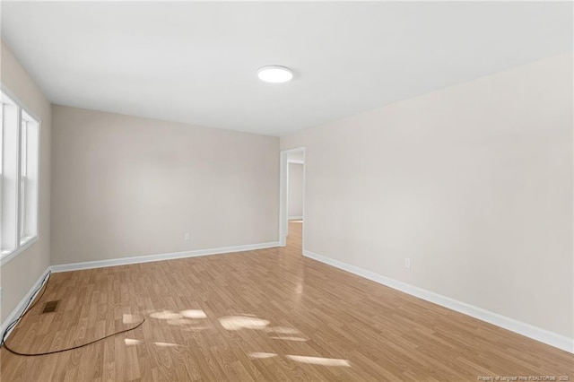 empty room featuring light wood-type flooring