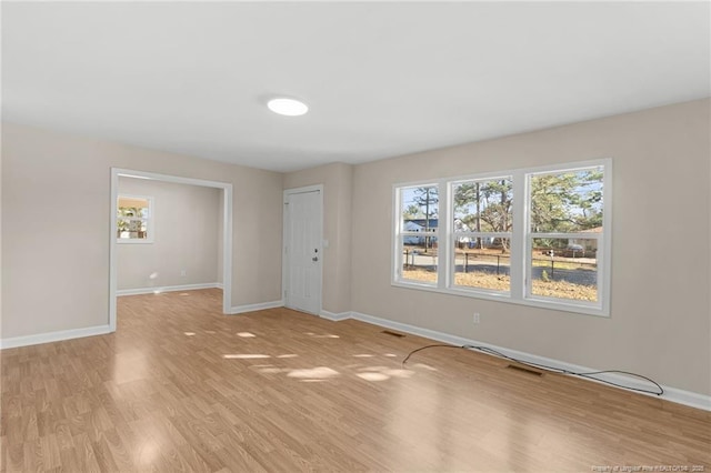 empty room featuring light hardwood / wood-style floors