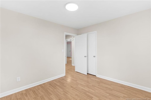 unfurnished bedroom with light hardwood / wood-style floors