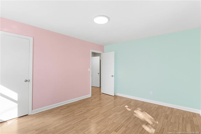 unfurnished bedroom featuring light hardwood / wood-style floors