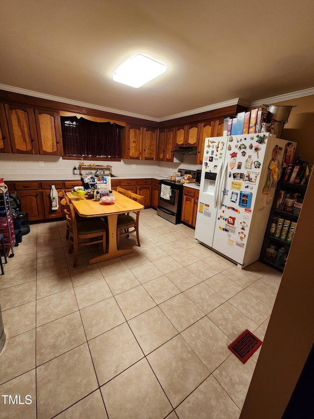 kitchen featuring electric range, light countertops, crown molding, white fridge with ice dispenser, and light tile patterned flooring