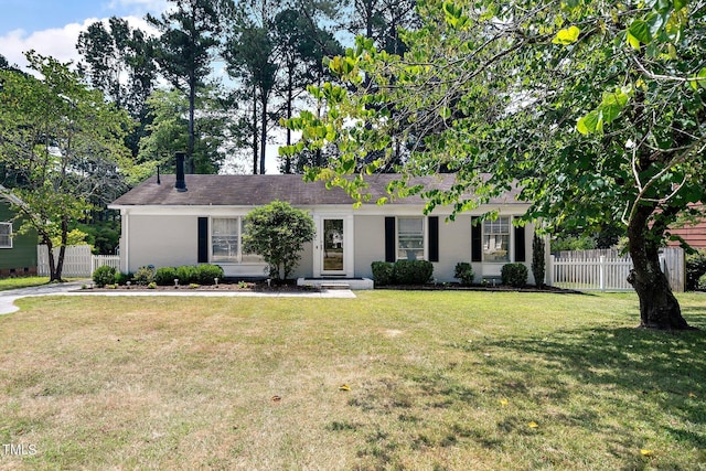 single story home with a front yard