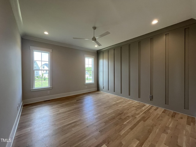 25 Deer Tail Ln Lot 52, Fuquay Varina, NC 27526 - spare room with crown molding, ceiling fan, wood finished floors, baseboards, and recessed lighting