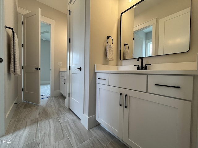 25 Deer Tail Ln Lot 52, Fuquay Varina, NC 27526 - bathroom featuring vanity, marble finish floors, and baseboards