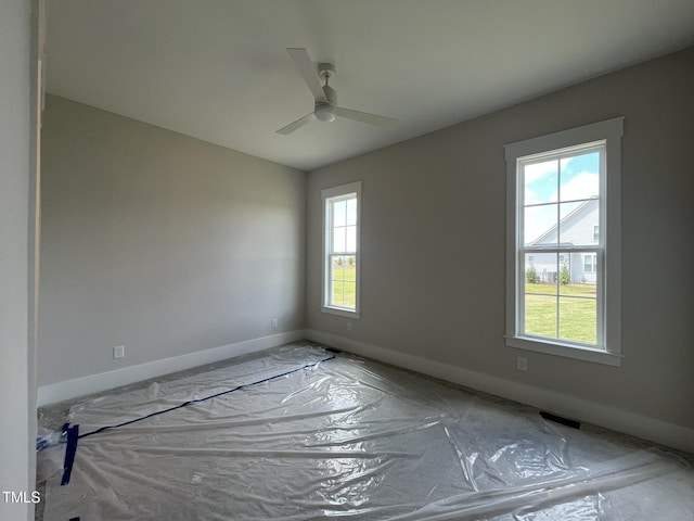 25 Deer Tail Ln Lot 52, Fuquay Varina, NC 27526 - spare room with healthy amount of natural light, baseboards, and ceiling fan