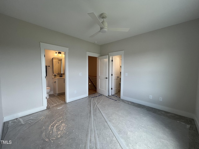 25 Deer Tail Ln Lot 52, Fuquay Varina, NC 27526 - unfurnished bedroom with baseboards, ensuite bath, a sink, and a ceiling fan
