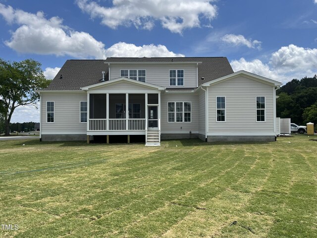 25 Deer Tail Ln Lot 52, Fuquay Varina, NC 27526 - back of house with a sunroom, a yard, and a shingled roof