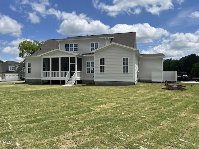 25 Deer Tail Ln Lot 52, Fuquay Varina, NC 27526 - rear view of house with a sunroom, a lawn, and a shingled roof