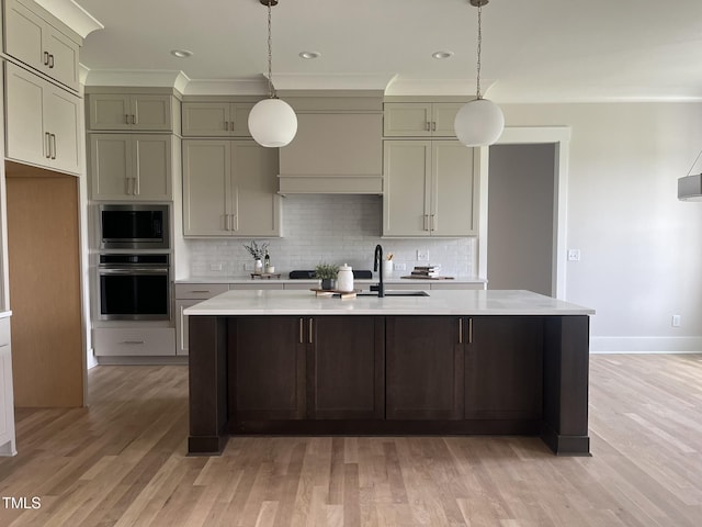 25 Deer Tail Ln Lot 52, Fuquay Varina, NC 27526 - kitchen with stainless steel appliances, a sink, tasteful backsplash, light wood-type flooring, and ornamental molding