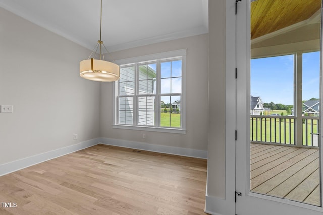 25 Deer Tail Ln Lot 52, Fuquay Varina, NC 27526 - empty room with light wood finished floors, ornamental molding, vaulted ceiling, and wood ceiling