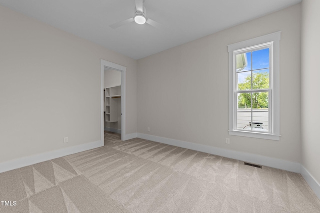 25 Deer Tail Ln Lot 52, Fuquay Varina, NC 27526 - carpeted spare room with baseboards and a ceiling fan