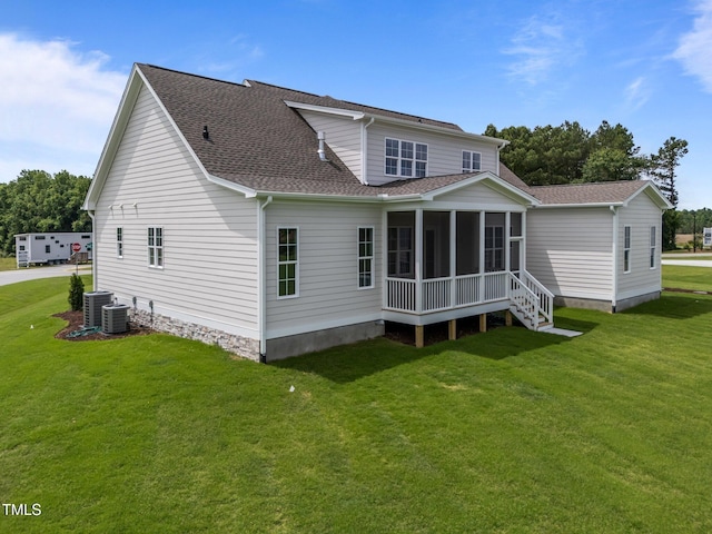 25 Deer Tail Ln Lot 52, Fuquay Varina, NC 27526 - rear view of house with a sunroom, a shingled roof, and a yard