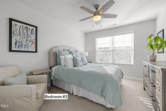 bedroom featuring ceiling fan and light colored carpet