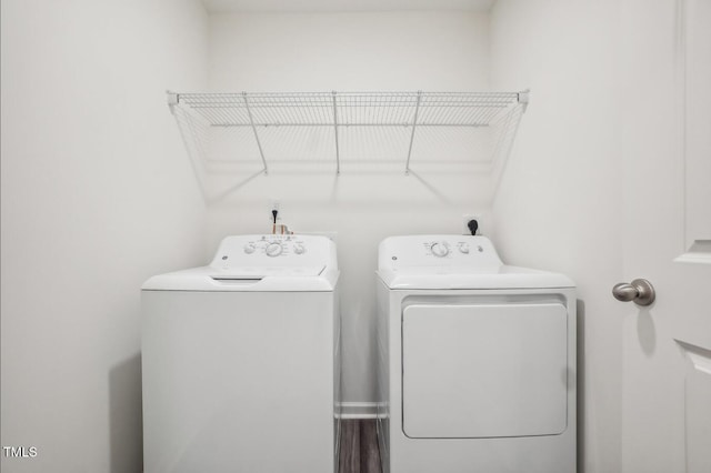 washroom featuring separate washer and dryer