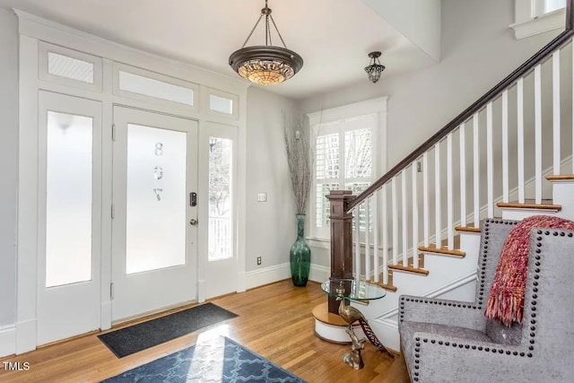 foyer with light hardwood / wood-style flooring