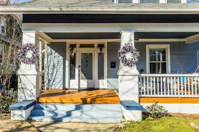 entrance to property with covered porch