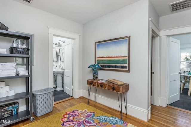 hall featuring hardwood / wood-style floors