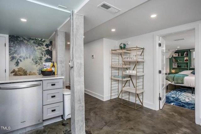 bathroom with concrete flooring