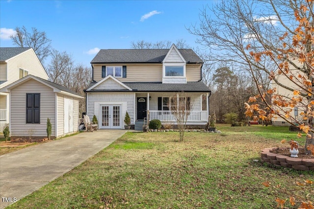 front facade with covered porch, a front yard, and french doors