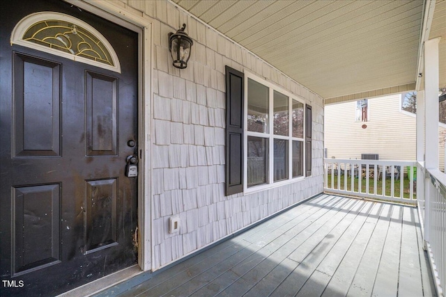 property entrance featuring covered porch