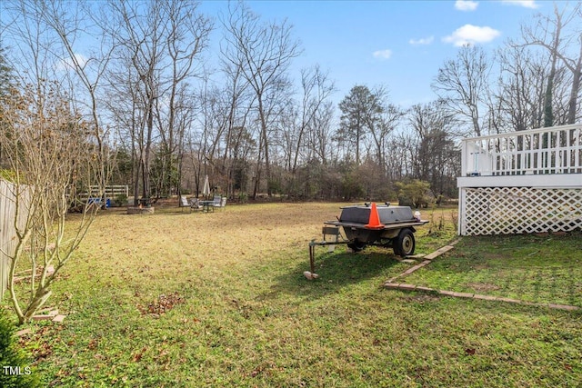 view of yard featuring a deck