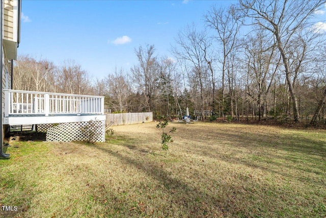 view of yard with a wooden deck