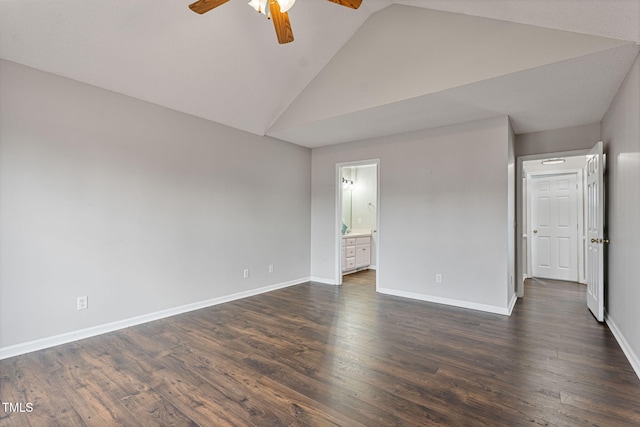 unfurnished bedroom with dark hardwood / wood-style flooring, connected bathroom, and ceiling fan