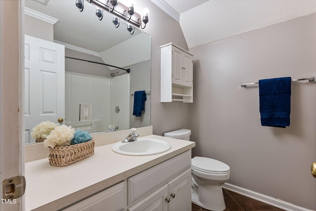 bathroom featuring vanity, crown molding, tile patterned flooring, toilet, and a textured ceiling