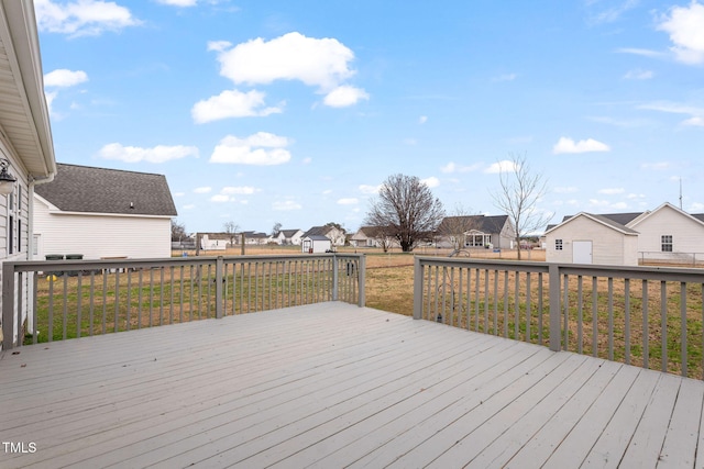 wooden deck with a yard