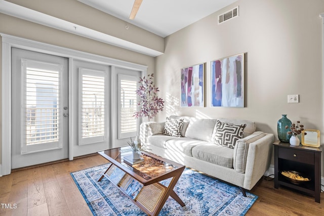 living room with hardwood / wood-style flooring