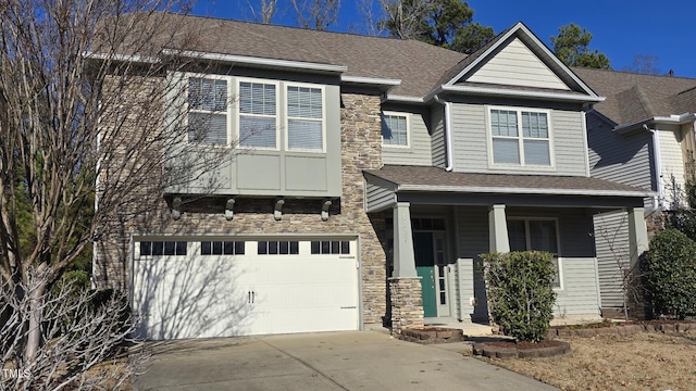 view of front of property with a garage