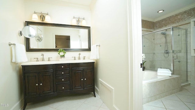 bathroom with tile patterned floors, crown molding, and vanity