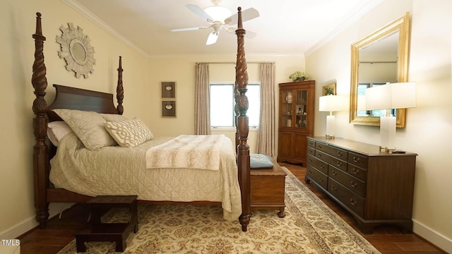 bedroom featuring ceiling fan, wood-type flooring, and ornamental molding