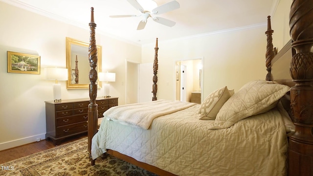 bedroom with dark wood-type flooring, ensuite bath, ceiling fan, and ornamental molding