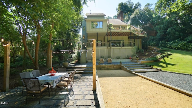 exterior space with a patio area and a balcony