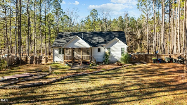 exterior space with a yard and a deck